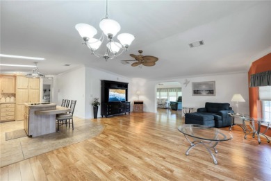 Spacious 2005 Triple-Wide Jacobsen built home situated on a 7 on Maple Leaf Golf and Country Club in Florida - for sale on GolfHomes.com, golf home, golf lot