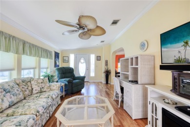 Spacious 2005 Triple-Wide Jacobsen built home situated on a 7 on Maple Leaf Golf and Country Club in Florida - for sale on GolfHomes.com, golf home, golf lot