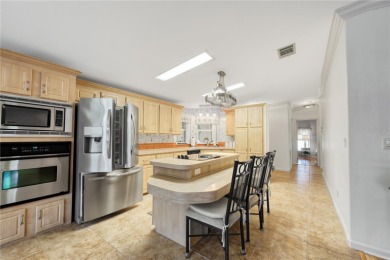 Spacious 2005 Triple-Wide Jacobsen built home situated on a 7 on Maple Leaf Golf and Country Club in Florida - for sale on GolfHomes.com, golf home, golf lot