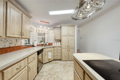 Spacious 2005 Triple-Wide Jacobsen built home situated on a 7 on Maple Leaf Golf and Country Club in Florida - for sale on GolfHomes.com, golf home, golf lot