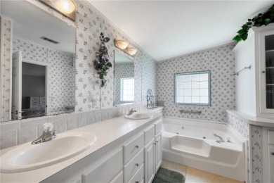 Spacious 2005 Triple-Wide Jacobsen built home situated on a 7 on Maple Leaf Golf and Country Club in Florida - for sale on GolfHomes.com, golf home, golf lot