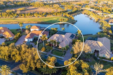 Sweeping water and fairway views abound in this custom-built on Boca Royale Golf and Country Club in Florida - for sale on GolfHomes.com, golf home, golf lot