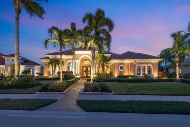 Sweeping water and fairway views abound in this custom-built on Boca Royale Golf and Country Club in Florida - for sale on GolfHomes.com, golf home, golf lot