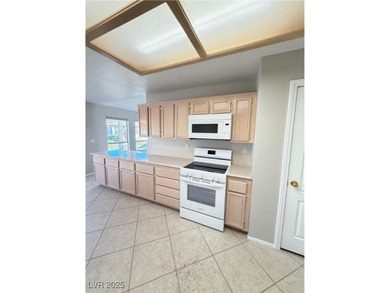 Stunning one story 1600 sqft 2/2 Bed/bath complemented by a on Painted Desert Golf Club in Nevada - for sale on GolfHomes.com, golf home, golf lot