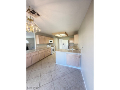 Stunning one story 1600 sqft 2/2 Bed/bath complemented by a on Painted Desert Golf Club in Nevada - for sale on GolfHomes.com, golf home, golf lot