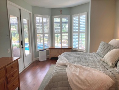 Updated Spotless Home with Stunning Golf Course Views in Calusa on Calusa Lakes Golf Club in Florida - for sale on GolfHomes.com, golf home, golf lot