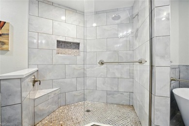 Stunning, completely remodeled end-unit first-floor coach home on West Bay Beach and Golf Club in Florida - for sale on GolfHomes.com, golf home, golf lot