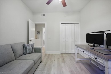 Stunning, completely remodeled end-unit first-floor coach home on West Bay Beach and Golf Club in Florida - for sale on GolfHomes.com, golf home, golf lot