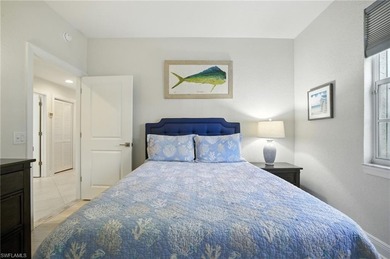 Stunning, completely remodeled end-unit first-floor coach home on West Bay Beach and Golf Club in Florida - for sale on GolfHomes.com, golf home, golf lot