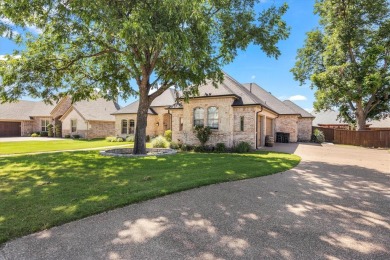 Nestled in a prestigious gated community with easy access to Hwy on Harbor Lakes Golf Club in Texas - for sale on GolfHomes.com, golf home, golf lot