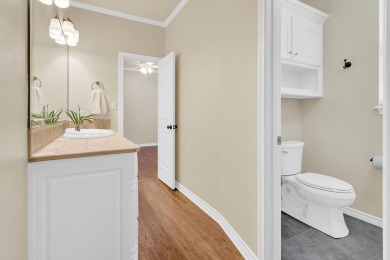 Welcome to your dream home in the charming Hideaway community! on Hide-A-Way Lake Golf Course in Texas - for sale on GolfHomes.com, golf home, golf lot