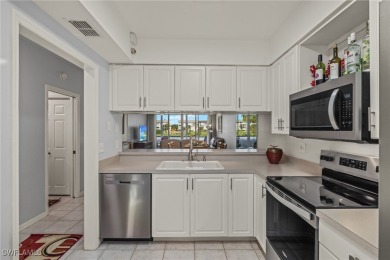 UPDATED main level CONDO with GOLF! Panoramic views of water on Golfview Golf and Racquet Club in Florida - for sale on GolfHomes.com, golf home, golf lot