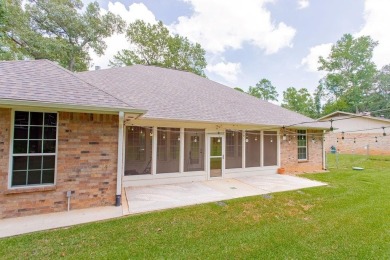 Welcome to your dream home in the charming Hideaway community! on Hide-A-Way Lake Golf Course in Texas - for sale on GolfHomes.com, golf home, golf lot