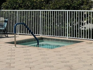 Stunning, completely remodeled end-unit first-floor coach home on West Bay Beach and Golf Club in Florida - for sale on GolfHomes.com, golf home, golf lot