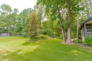 Welcome to your dream home in the charming Hideaway community! on Hide-A-Way Lake Golf Course in Texas - for sale on GolfHomes.com, golf home, golf lot
