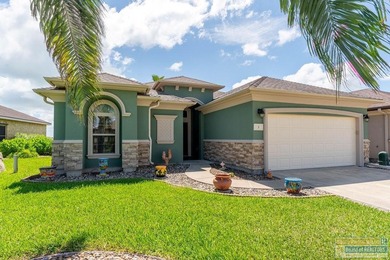 Beautiful, custom stand-alone Golf Villa with lake view. Spend on South Padre Island Golf Club in Texas - for sale on GolfHomes.com, golf home, golf lot