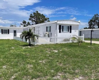DISCOVER MOBILE GARDENS! Waterfront community with two boat on Oyster Creek Golf Club in Florida - for sale on GolfHomes.com, golf home, golf lot