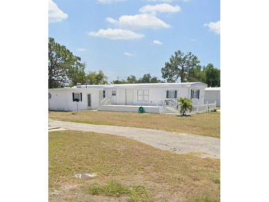 DISCOVER MOBILE GARDENS! Waterfront community with two boat on Oyster Creek Golf Club in Florida - for sale on GolfHomes.com, golf home, golf lot
