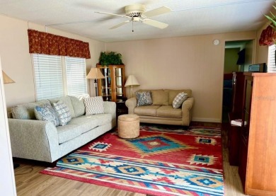 DISCOVER MOBILE GARDENS! Waterfront community with two boat on Oyster Creek Golf Club in Florida - for sale on GolfHomes.com, golf home, golf lot