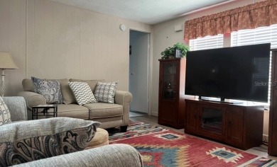 DISCOVER MOBILE GARDENS! Waterfront community with two boat on Oyster Creek Golf Club in Florida - for sale on GolfHomes.com, golf home, golf lot