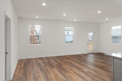 Primary on the main, open living space, 3 bedrooms up, AND a on Cookeville Golf  Club in Tennessee - for sale on GolfHomes.com, golf home, golf lot