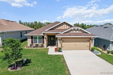 Scenically situated along the 10th hole tee of the highly on Twisted Oaks Golf Club in Florida - for sale on GolfHomes.com, golf home, golf lot