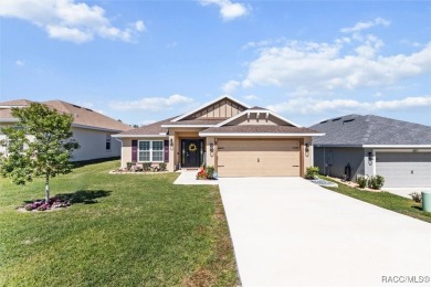 Scenically situated along the 10th hole tee of the highly on Twisted Oaks Golf Club in Florida - for sale on GolfHomes.com, golf home, golf lot