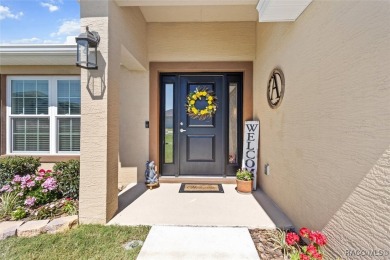 Scenically situated along the 10th hole tee of the highly on Twisted Oaks Golf Club in Florida - for sale on GolfHomes.com, golf home, golf lot