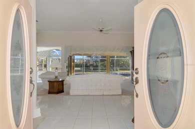 Don't miss out on this custom-built home with stunning pond and on Pinemoor West Golf Club in Florida - for sale on GolfHomes.com, golf home, golf lot