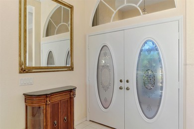 Don't miss out on this custom-built home with stunning pond and on Pinemoor West Golf Club in Florida - for sale on GolfHomes.com, golf home, golf lot