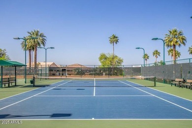 Imagine peaceful mornings on your wrap-around patio, surrounded on Sun Lakes Country Club in Arizona - for sale on GolfHomes.com, golf home, golf lot