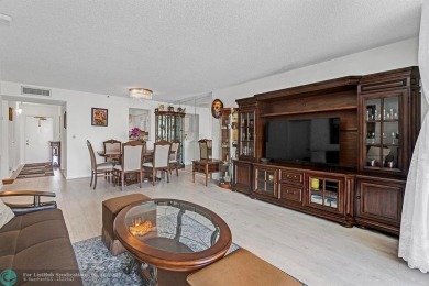Backyard beauty! This so beautiful, light, bright condo home in on Marina Lakes Golf Course in Florida - for sale on GolfHomes.com, golf home, golf lot