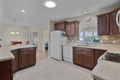 Discover the CHARM of this beautifully UPGRADED 2/2 AUSTIN model on Tierra Del Sol Golf and Country Club in Florida - for sale on GolfHomes.com, golf home, golf lot