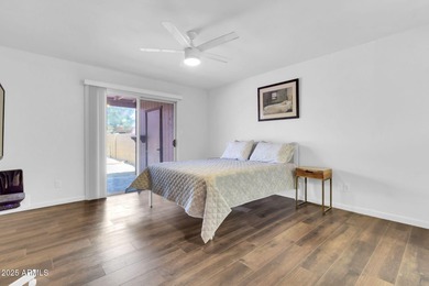 Imagine peaceful mornings on your wrap-around patio, surrounded on Sun Lakes Country Club in Arizona - for sale on GolfHomes.com, golf home, golf lot