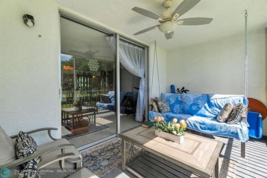 Backyard beauty! This so beautiful, light, bright condo home in on Marina Lakes Golf Course in Florida - for sale on GolfHomes.com, golf home, golf lot