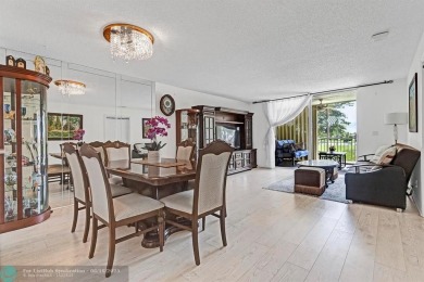 Backyard beauty! This so beautiful, light, bright condo home in on Marina Lakes Golf Course in Florida - for sale on GolfHomes.com, golf home, golf lot