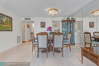 Backyard beauty! This so beautiful, light, bright condo home in on Marina Lakes Golf Course in Florida - for sale on GolfHomes.com, golf home, golf lot