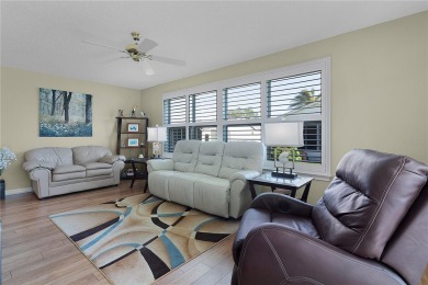 Discover the CHARM of this beautifully UPGRADED 2/2 AUSTIN model on Tierra Del Sol Golf and Country Club in Florida - for sale on GolfHomes.com, golf home, golf lot