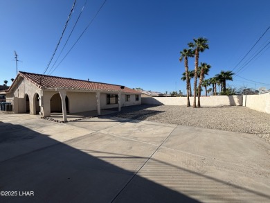 Close to the golf course. This charming home with plenty of on London Bridge Golf Course in Arizona - for sale on GolfHomes.com, golf home, golf lot