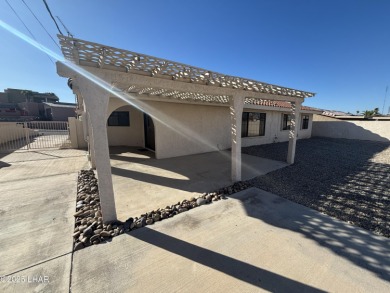 Close to the golf course. This charming home with plenty of on London Bridge Golf Course in Arizona - for sale on GolfHomes.com, golf home, golf lot