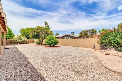 Imagine peaceful mornings on your wrap-around patio, surrounded on Sun Lakes Country Club in Arizona - for sale on GolfHomes.com, golf home, golf lot