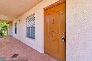 Backyard beauty! This so beautiful, light, bright condo home in on Marina Lakes Golf Course in Florida - for sale on GolfHomes.com, golf home, golf lot