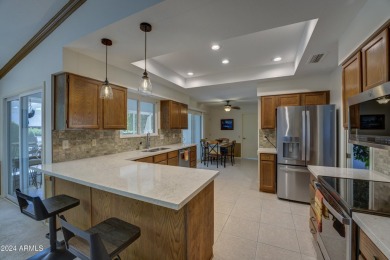 You will be delighted by this beautifully updated Hopi model on Stardust Golf Course in Arizona - for sale on GolfHomes.com, golf home, golf lot