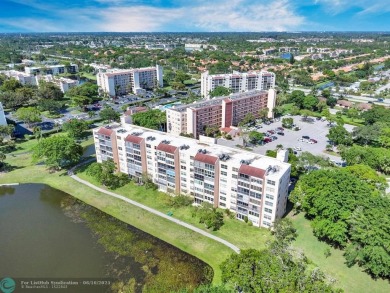 Backyard beauty! This so beautiful, light, bright condo home in on Marina Lakes Golf Course in Florida - for sale on GolfHomes.com, golf home, golf lot