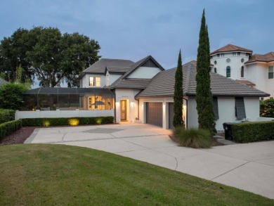 This private, tucked-away residence is perfectly located on the on Lake Nona Golf Club, Inc. in Florida - for sale on GolfHomes.com, golf home, golf lot