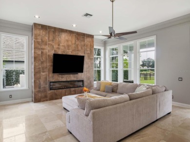 This private, tucked-away residence is perfectly located on the on Lake Nona Golf Club, Inc. in Florida - for sale on GolfHomes.com, golf home, golf lot