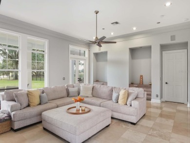 This private, tucked-away residence is perfectly located on the on Lake Nona Golf Club, Inc. in Florida - for sale on GolfHomes.com, golf home, golf lot