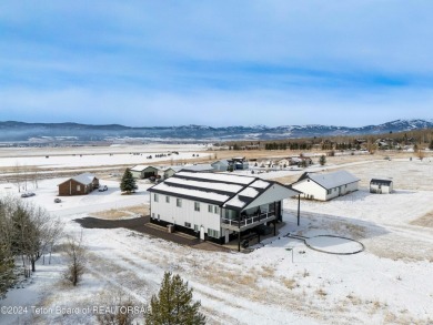 Discover the perfect blend of modern luxury and Wyoming's on Star Valley RV Golf Course in Wyoming - for sale on GolfHomes.com, golf home, golf lot