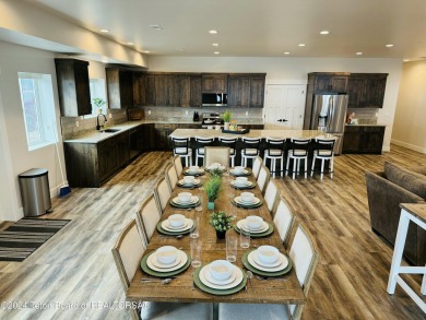 Discover the perfect blend of modern luxury and Wyoming's on Star Valley RV Golf Course in Wyoming - for sale on GolfHomes.com, golf home, golf lot