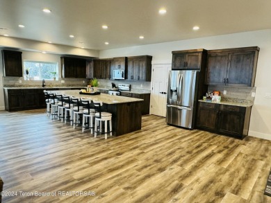 Discover the perfect blend of modern luxury and Wyoming's on Star Valley RV Golf Course in Wyoming - for sale on GolfHomes.com, golf home, golf lot